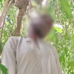 Disturbing Photos: 35-Year Old Man Hangs Self With Rope Tied To Tree