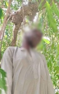 Disturbing Photos: 35-Year Old Man Hangs Self With Rope Tied To Tree