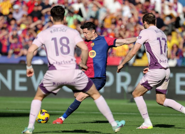 Barcelona Blitz: Lewandowski’s Double Seals Top Spot in La Liga Thrashing of Girona