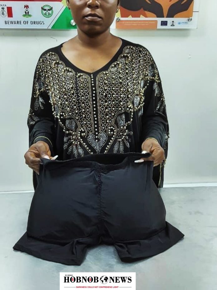 “Shocking Discovery: Businesswoman Caught Smuggling 1.4kg of Meth in Her Bum Pad at Lagos Airport!