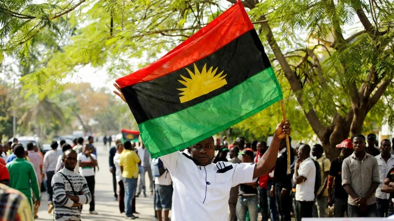 A-supporter-of-Indigenous-People-of-Biafra-IPOB-leader-Nnamdi-Kanu-holds-a-Biafra-flag-during-a-rally-in-support-of-Kanu-1536x864
